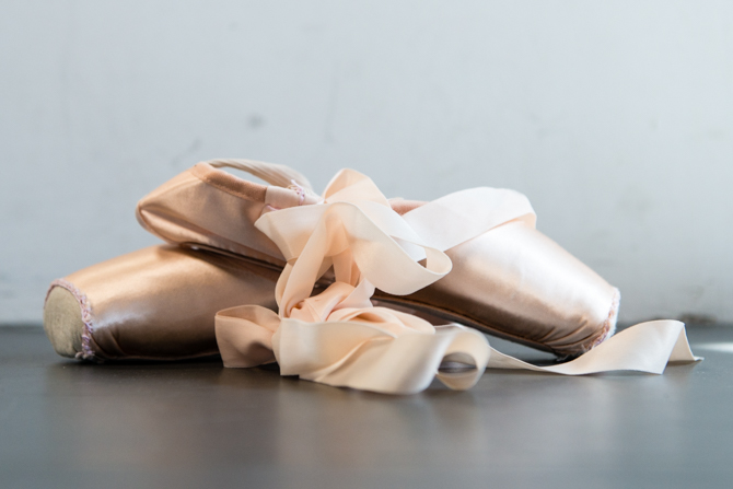 Ballet shoes have a hard base made of layers of paper, leather, or burlap.  Allynne Noelle said ballerinas often suffer from achilles tendinitis and ankle sprains.  “It’s not uncommon to hear snap,” she said (Photo by Heidi de Marco/KHN).