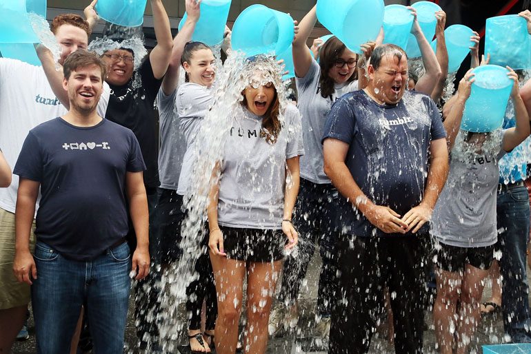 Employees of Tumblr take the ALS Ice Bucket Challenge. (Photo by Astrid Stawiarz/Getty Images)