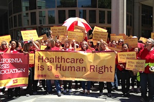 Members of the California Nurses Association rally in May in Sacramento (Photo by April Dembosky/KQED).