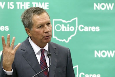 Ohio Gov. John Kasich speaks about Medicaid expansion at the Cleveland Clinic in October 2013. (AP Photo/Tony Dejak, File)