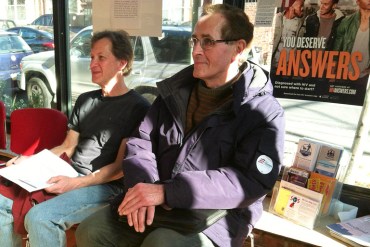 Jay Herskowitz, left and Joseph Krakauskas sought enrollment help at the Northern Liberties Community Center in Philadelphia Saturday. Krakauskas was first to arrive, an hour early (Photo by Alana Gordon/WHYY).