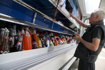 Soda bottles are displayed in a food truck's cooler on July 2014 in San Francisco. A ballot measure to tax soda failed in San Francisco. (Photo by Justin Sullivan/Getty Images)
