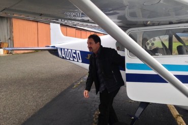 Palliative medicine physician Michael Fratkin gets off a plane after visiting a patient on the Hoopa Valley Indian Reservation. He's recently launched a startup to support this kind of work (Photo by April Dembosky/KQED).