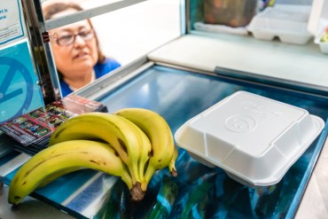 As part of a food project funded by the National Institute of Health Researchers, owner Elba Ramirez added healthy combo options that substitute fruit and salads for fries (Photo by Heidi de Marco/KHN).