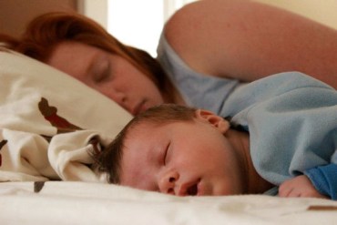 Elizabeth Harmon with son, Orin, who is just a few days old in this picture. They are resting at home between medical appointments. (Photo by Britt Harmon)