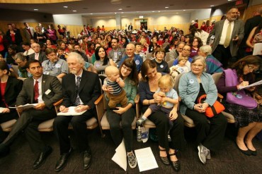 Anti-vaccine protesters gathered inside a hearing room in the Capitol building in Sacramento Wednesday, but the bill that would make it harder to opt out of immunizations passed the state Senate health committee. (Photo by Pauline Bartolone/Capital Public Radio)