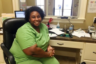 LaTasha Perry, 31, works at a community health center in Plaquemine, Louisiana.  Perry says getting insured under Obamacare was cheaper than paying the penalty (Photo by Jeff Cohen/WNPR).