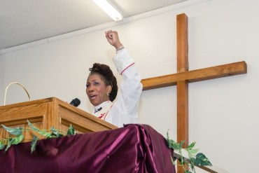 Bishop Gwendolyn Stone at the God Answers Prayer Ministries of Los Angeles on May 3, 2015 (Photo by Heidi de Marco/Kaiser Health News).