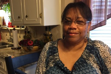 Sheron Bazille pays $219.01 for her health insurance. She knows the amount down to the penny. (Photo by Jeff Cohen/WNYC)