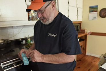 Danny Wilson, 60, checks out his medication at his home in Lizella on  June 4, 2015. He hoped to work until the day he died. Instead, he worked until a stroke last winter sidelined him from his job of 25 years. Now, Wilson is one of 430,000 Georgians who could lose the federal tax credits that allow them to be able to afford health insurance. (Photo by Hyosub Shin/Atlanta Journal-Constitution)