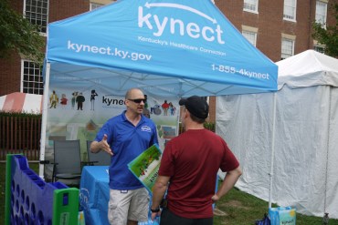 A Kynect booth at a festival in Bardestown, Ky., in 2013. Kynect, Kentucky's health exchange, has been successful even as enrollment there in the small business exchange lags. (Photo by Phil Galewitz/KHN)