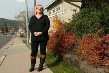 Lori Lomas, an insurance agent with Feather Financial in Quincy, Calif., has noticed that her clients in San Francisco have many more health carrier options than her mountain neighbors. (Photo by Pauline Bartolone/Capital Public Radio).