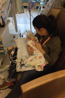 Amy Thompson holds 2-month-old Isla at Seattle Children's Hospital. When the Thompson family learned Isla's heart was failing, they took an air ambulance from Butte to Seattle to get medical care. (Courtesy Thompson family)
