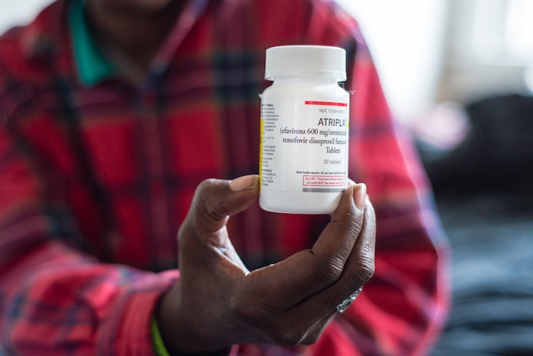 Loren Jones takes antiretroviral drugs to suppress her HIV viral load. (Heidi de Marco/KHN)