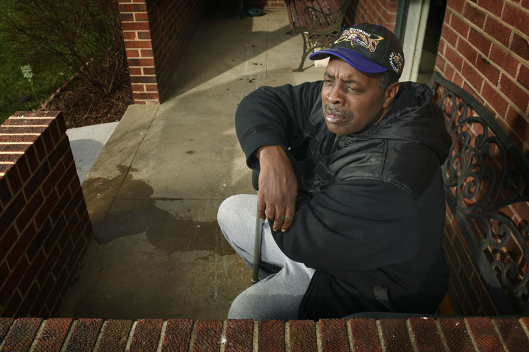 Robert Peace, outside the home of his brother in Northeast Baltimore on Jan. 15, 2016. (Doug Kapustin for KHN)