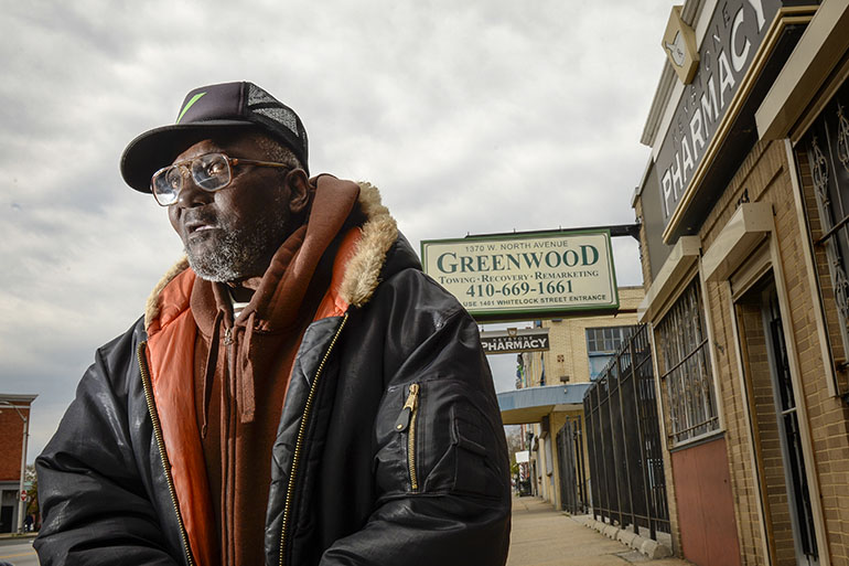 Ellis Basnight, 71, says he relies on the independent Keystone Pharmacy, which is a 15-minute walk from his house. Keystone’s been in the neighborhood for decades, and was one of the stores looted in last spring’s protests. (Doug Kapustin for KHN)