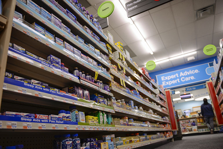 The new CVS contains several aisles of over-the-counter medications, a contrast to the much smaller Keystone. As a major national corporation, CVS can offer a wider array of goods than can its independent peers. (Doug Kapustin for KHN)