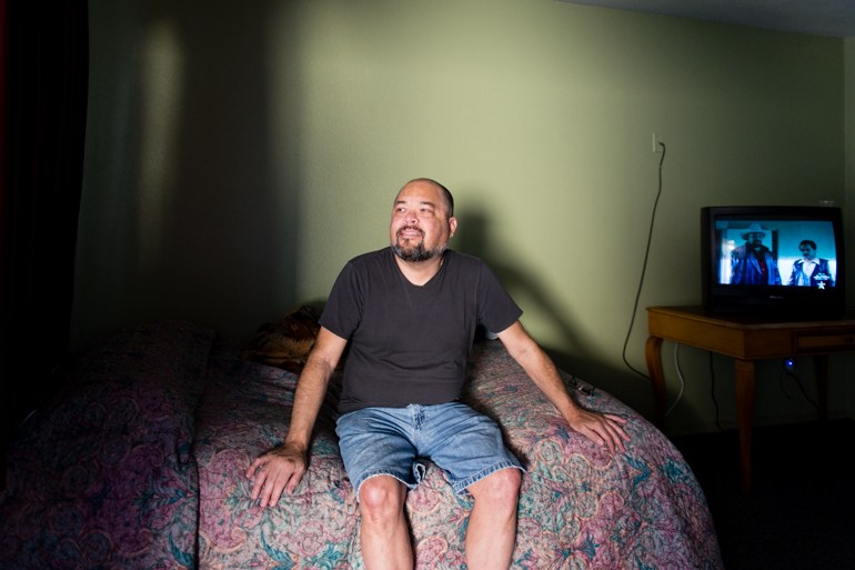 Elvin Quiñones, 55, in his room at the Coral Motel in Buena Park, Calif., on Friday, February 12, 2016. After gallbladder surgery, Quiñones didn’t have anywhere to recover and ended up at the motel used by the Illumination Foundation Recuperative Care . (Heidi de Marco/KHN)