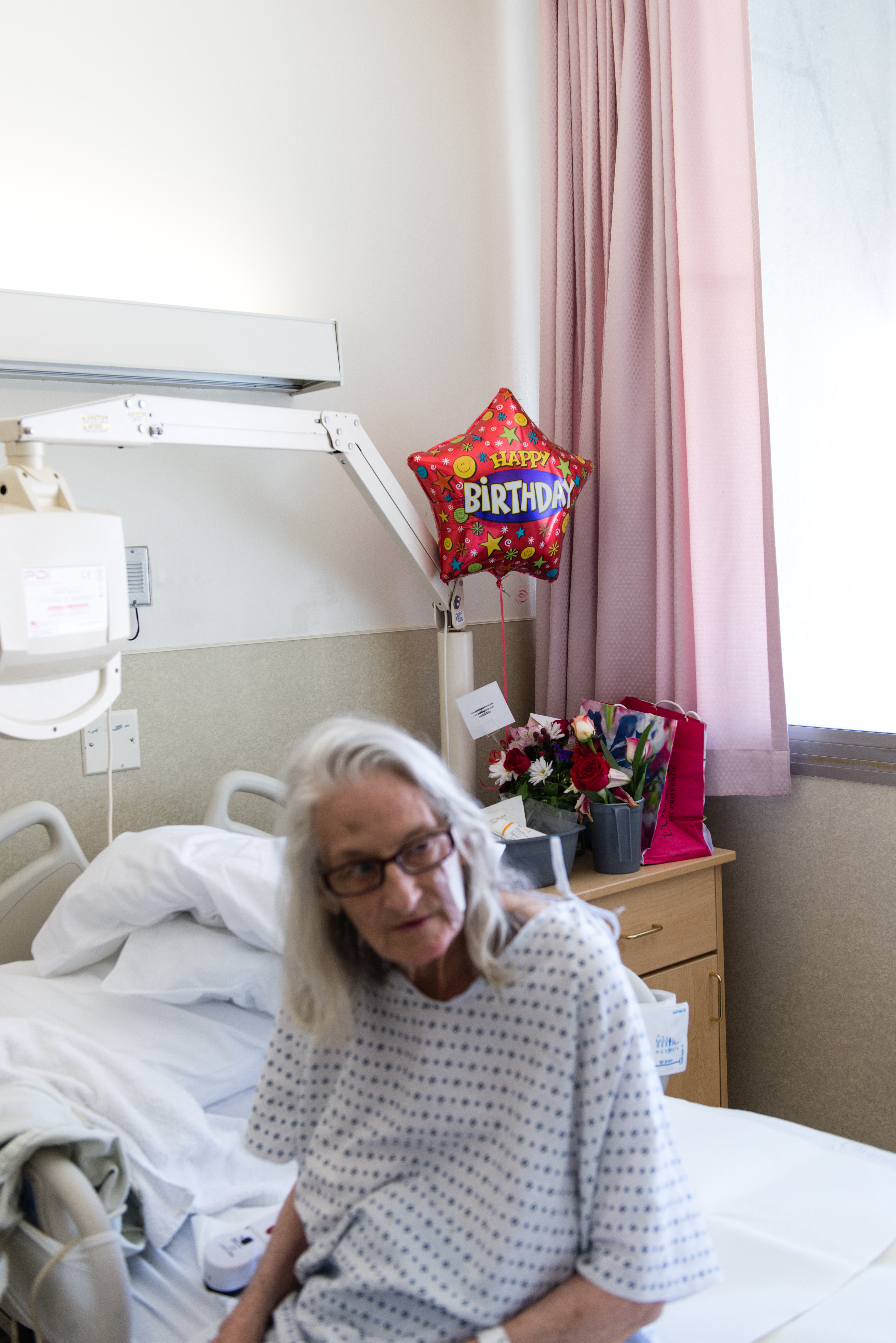Patient Janet Prochazka celebrated her birthday during her stay at San Francisco General Hospital. Prochazka was admitted to the hospital in March after injuring herself in a fall. (Heidi de Marco/KHN)