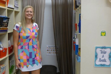 Teacher Erica Smith stands in front of the safe place in her classroom, an area where Laney went to cool down when she got frustrated. (Jenny Gold/KHN)