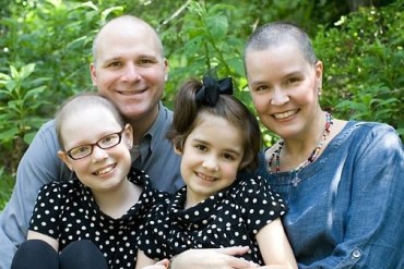 Georgia Moore, front left, was diagnosed with leukemia and because she was undergoing chemotherapy that impacted her immune system, she had to stay home from her small, private school in 2010, when this photo was taken. Her parents, Trevor and Courtney Moore, had to work to make sure that her younger sister, Ivy, didn’t bring home germs that could endanger Georgia. (Courtesy of the Moore family)