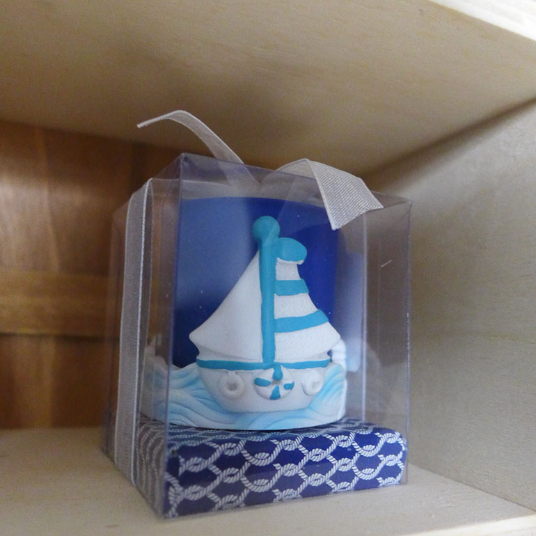 A small figurine of a boat sits on a shelf in the nursery of Keishla Mojica and John Rodriguez in Mojica’s mother’s home in November 2016 in Caguas, Puerto Rico. The couple settled on the room’s decoration after a compromise between the couple; Rodriguez chose the theme for the baby shower, Mojica the theme for the nursery. (Carmen Heredia Rodriguez/KHN)