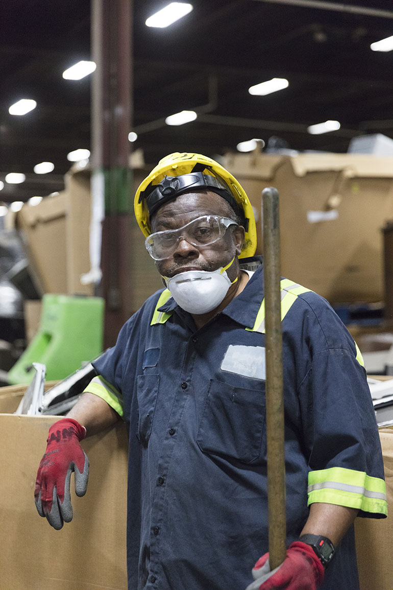 Henderson works at Recycle Force in Indianapolis, Indiana (Philip Scott Andrews/For KHN)