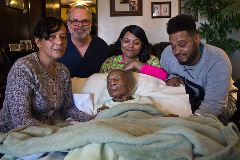 Bobo with her mother and home health nurse Dave Wilson; her son David's fiancee, Angel; and David. (Kimberly Paynter/WHYY)