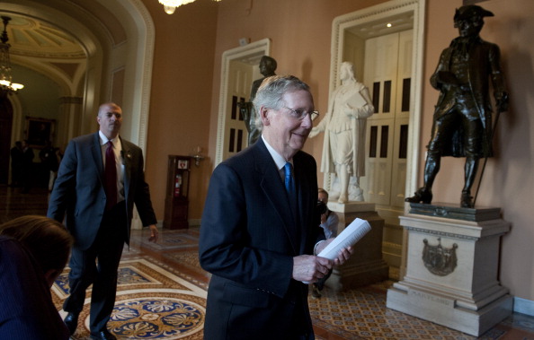 Senate Minority Leader Mitch McConnell, R-KY., heads to his office in the U. S. Capitol on September 30, 2013. The House of Representatives passed a continuing resolution with language to defund U.S. President Barack Obama's national health care plan (Obamacare) two days ago. (Douglas Graham/CQ Roll Call)