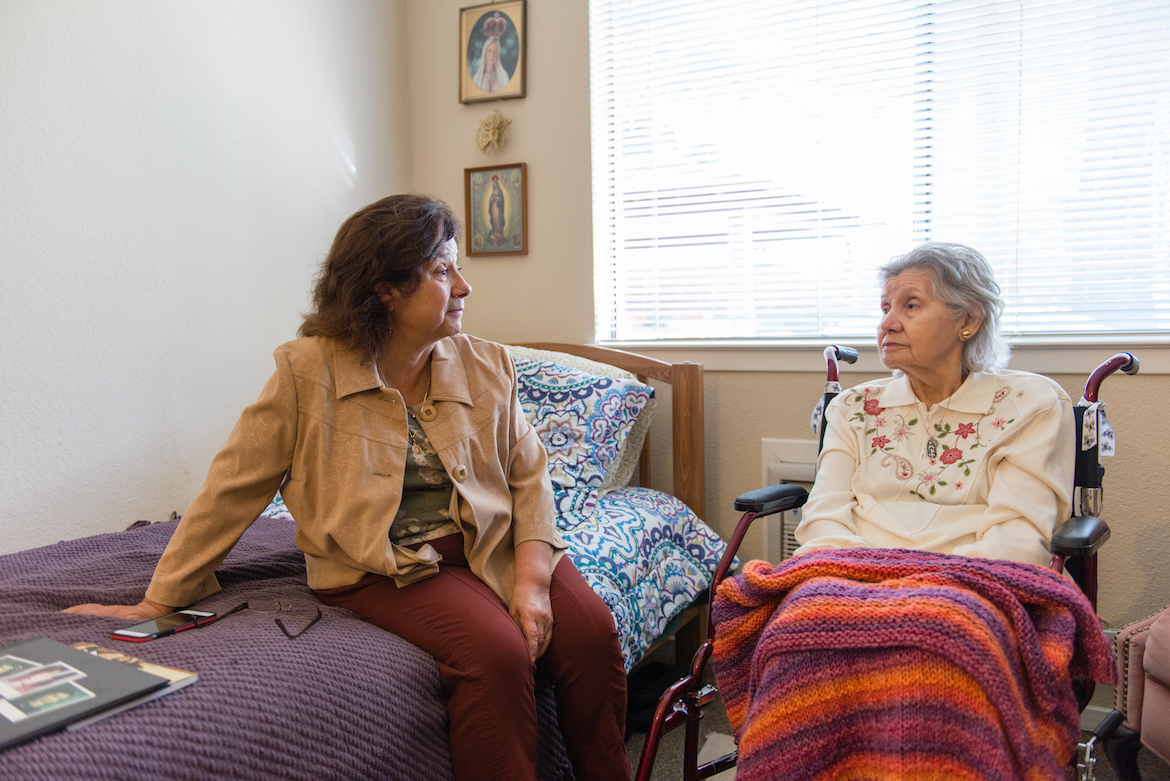 Barbara Marquez visits her mother Florence Marquez at her nursing home on Friday, December 16, 2016. Barbara was her mother’s primary caregiver until the family decided to put their mother in a 24-hour care facility. (Heidi de Marco/KHN)