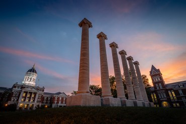 Architectural columns and Jesse Hall on the campus of University of Missouri