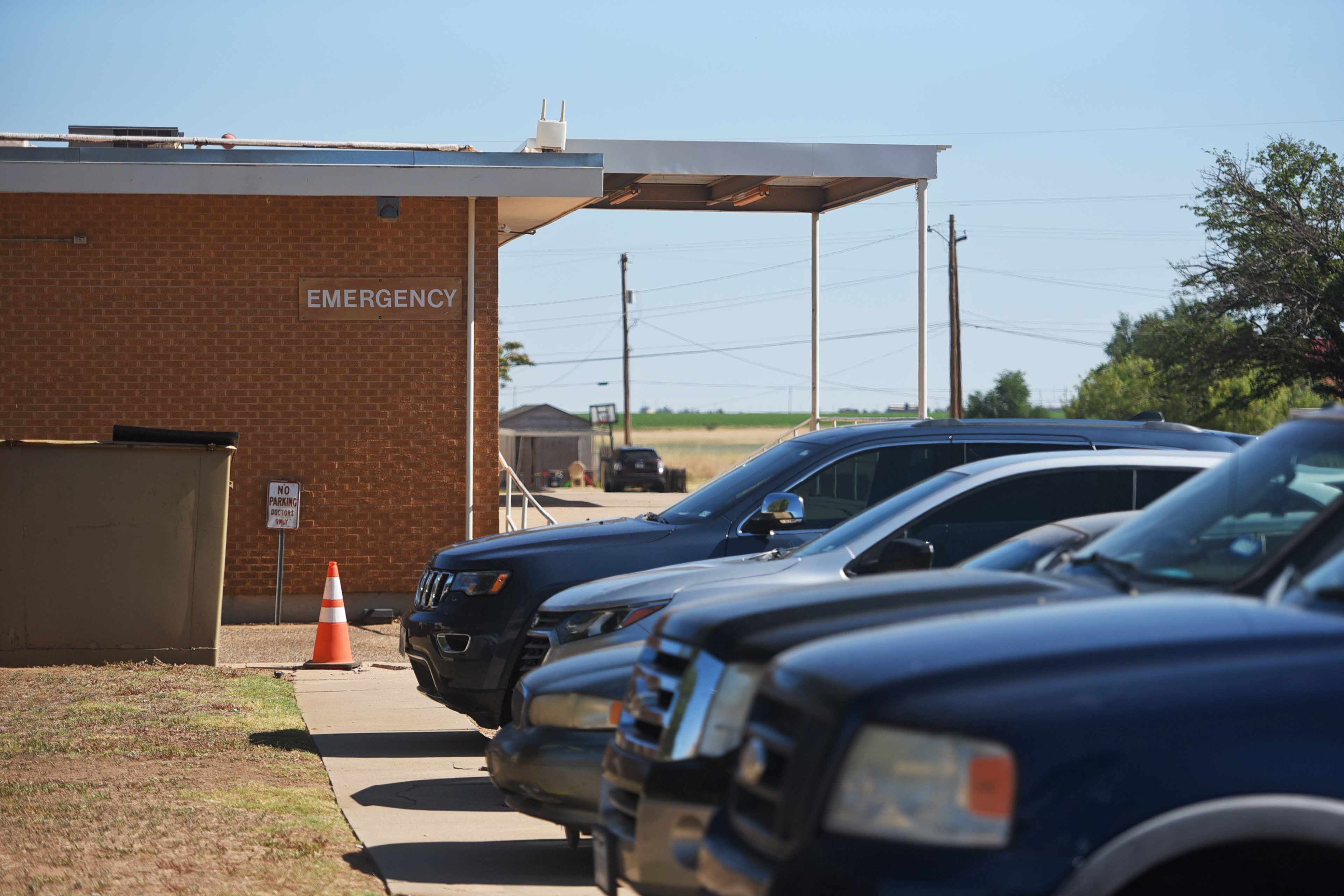 A photo shows cars parked in the parking lot by Crosybton Clinic Hospital.