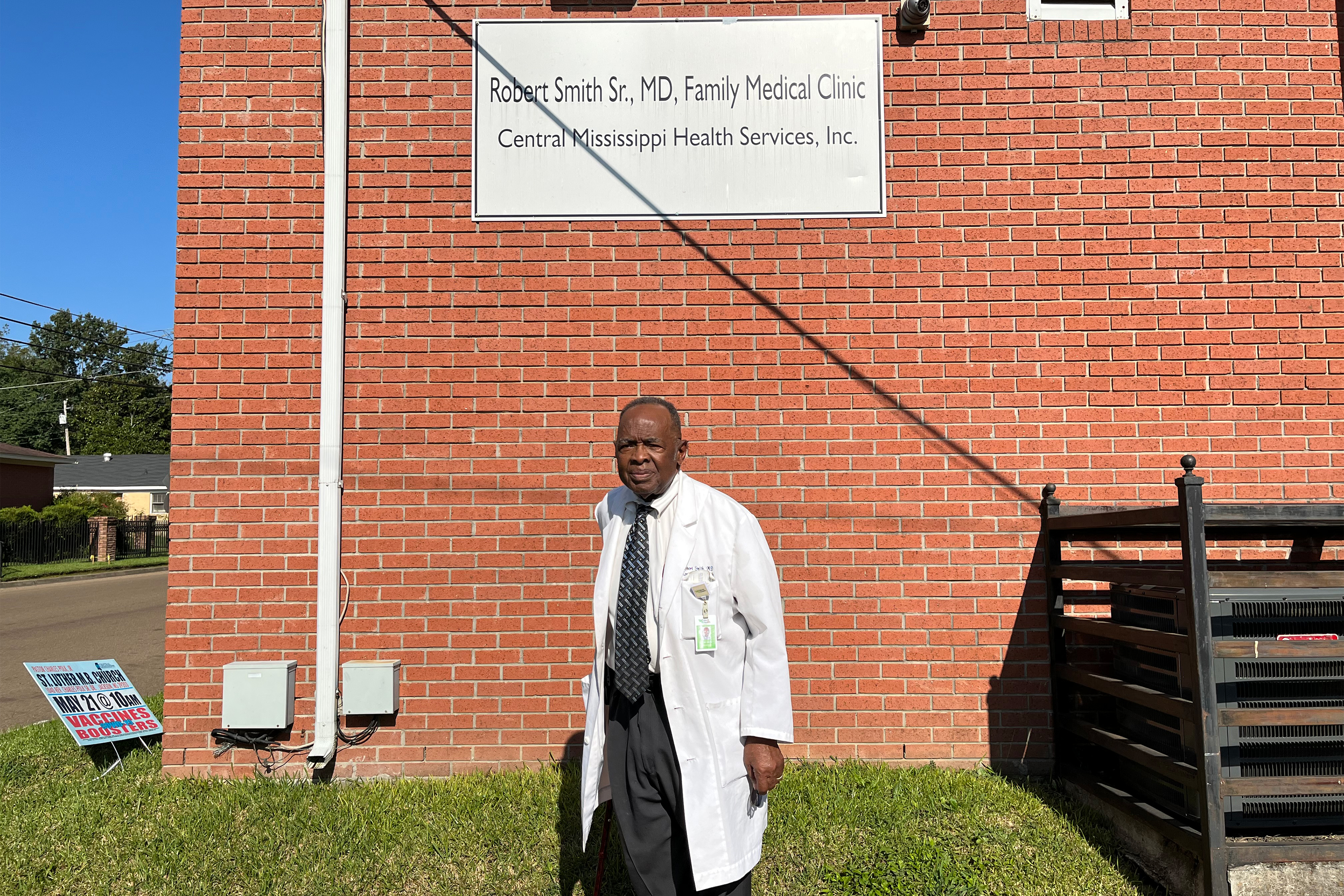 A photo shows Dr. Robert Smith standing outside the Central Mississippi Health Services building.