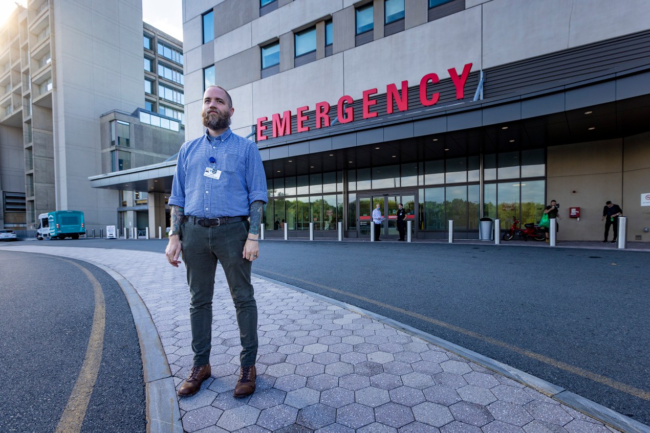 A photo shows David Cave standing outside Salem Hospital's emergency department.