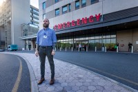 A photo shows David Cave standing outside Salem Hospital's emergency department.