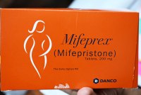 A photo shows a box of Mifepristone pills.