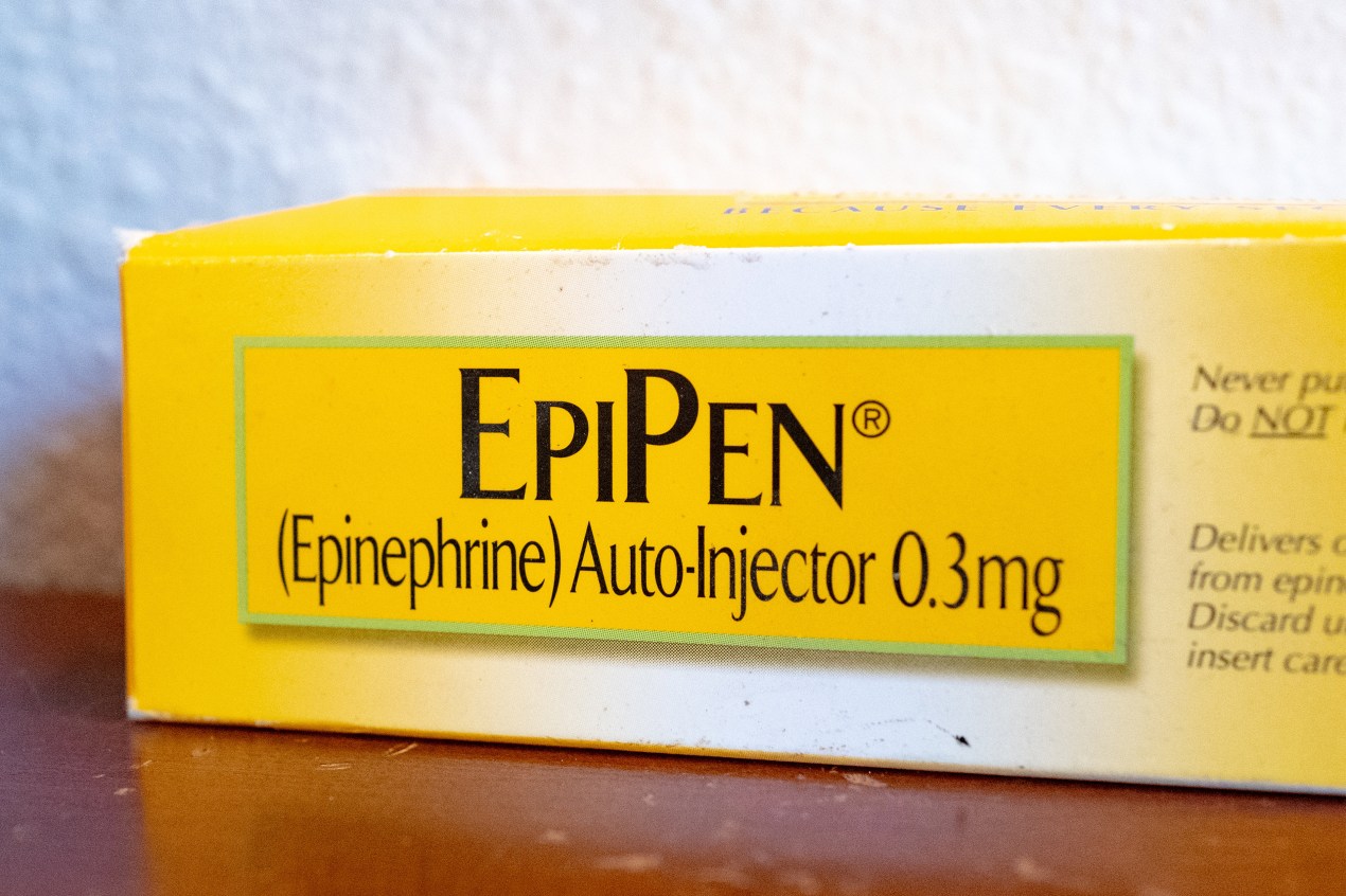 A photo shows a box containing an EpiPen.