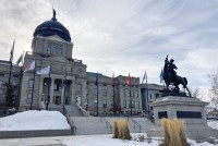 A photo shows the exterior of Montana's Capitol.