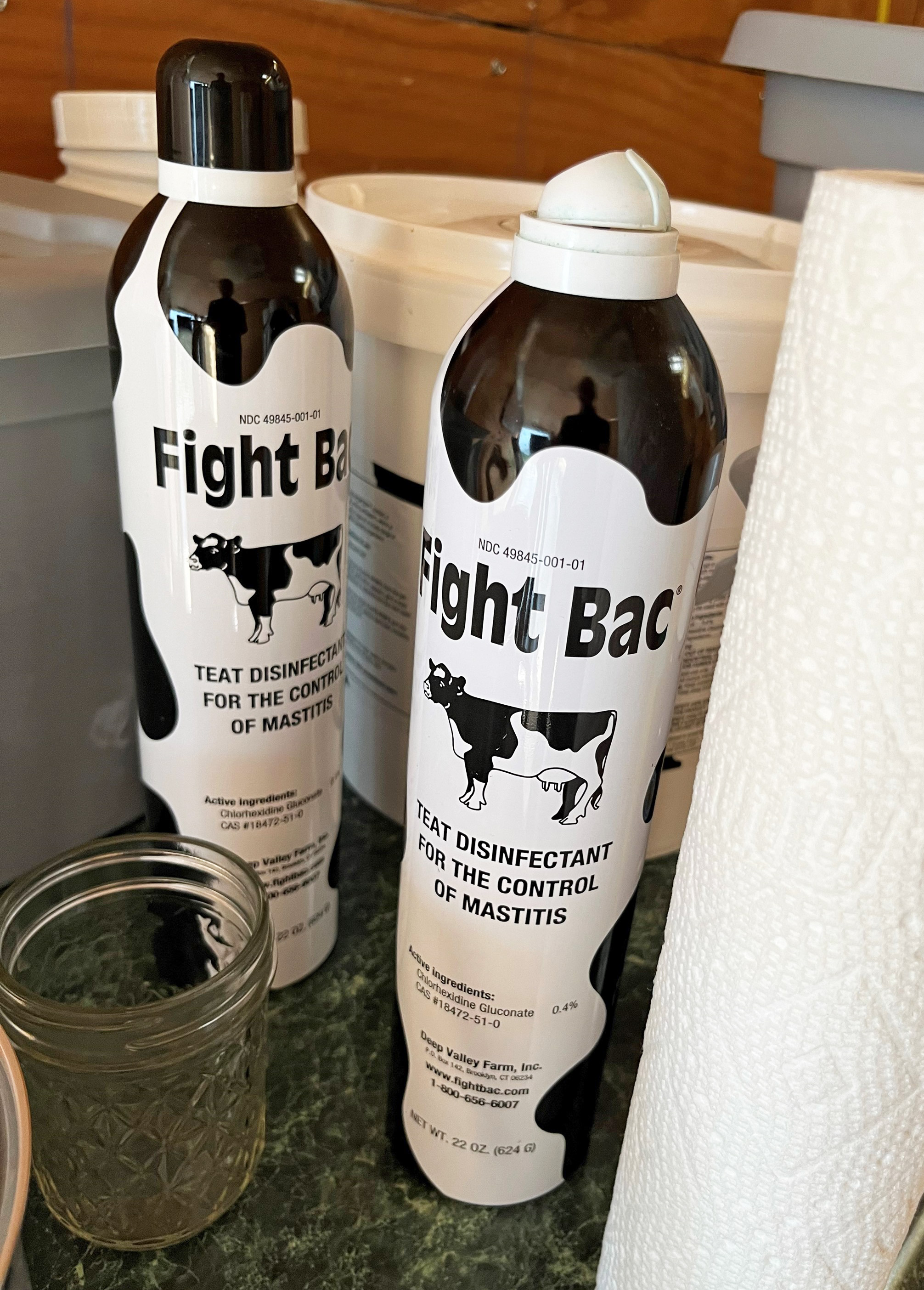 A photo of two bottles of udder disinfectant.