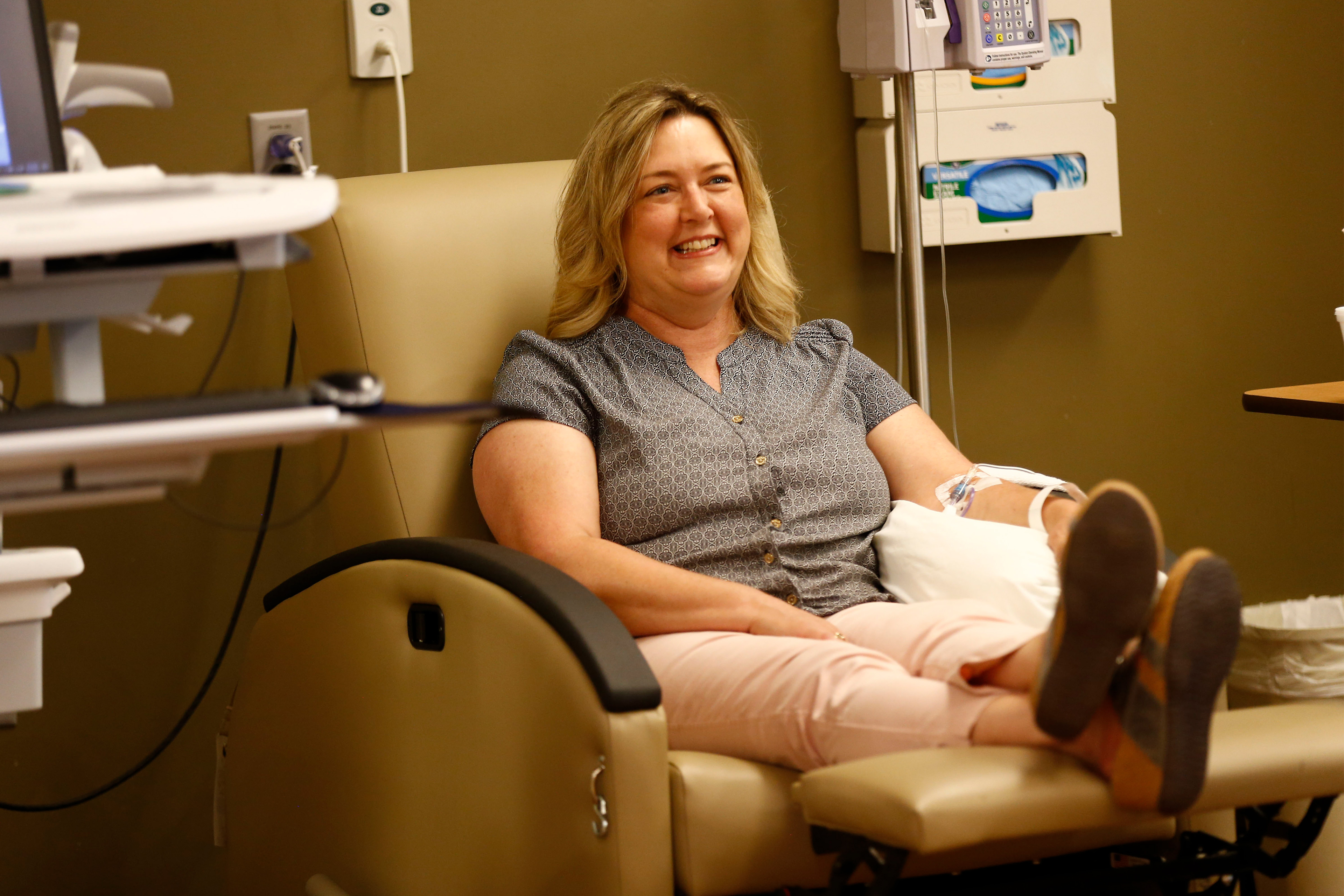 A photo of Paula Bruton Shepard receiving an infusion at a hospital.