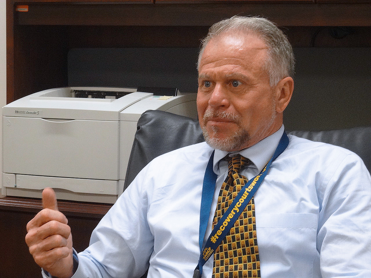 A photo of Judge Slone sitting indoors.