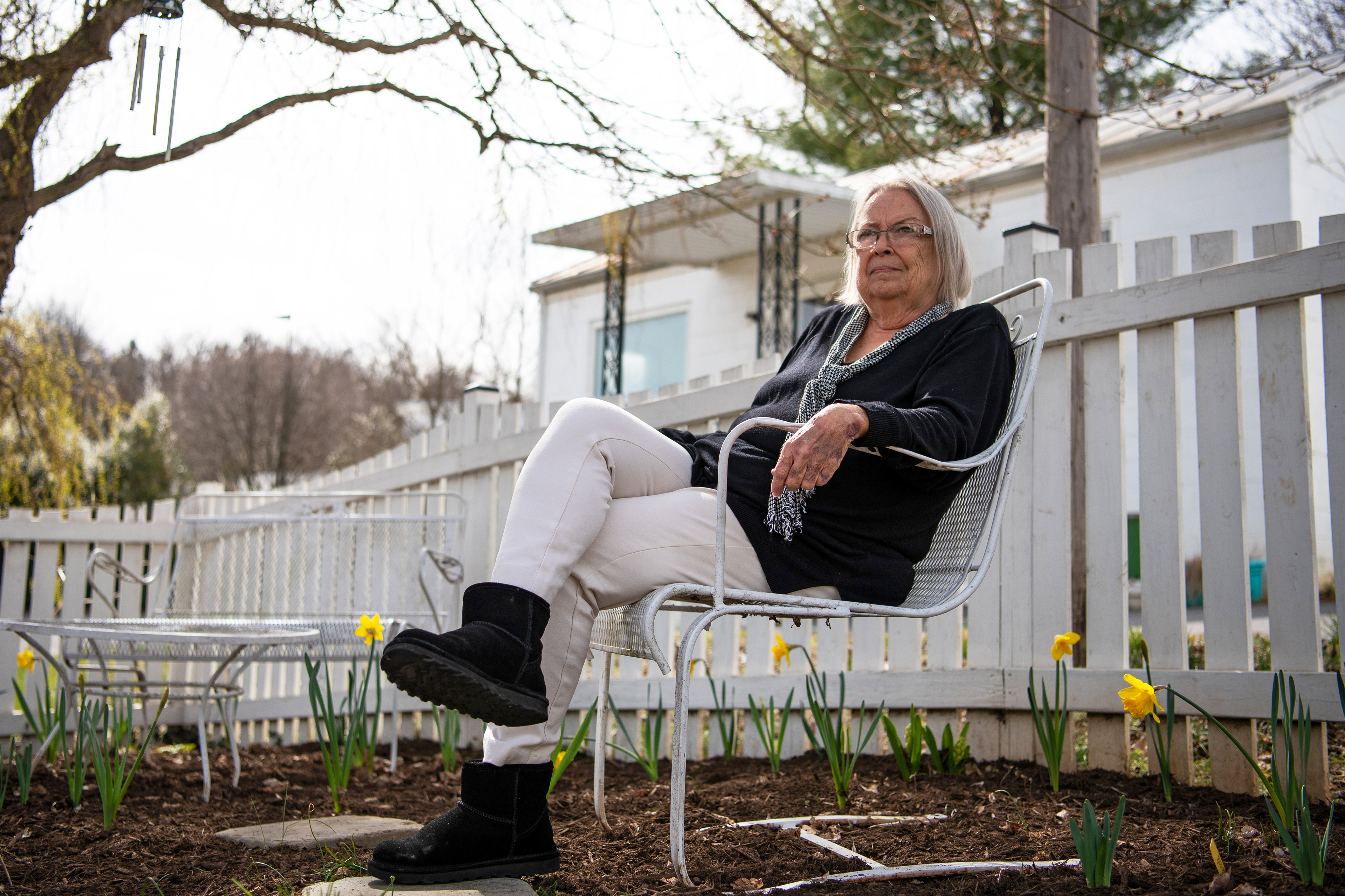 A photo of Nieltje Gedney sitting outside at home.