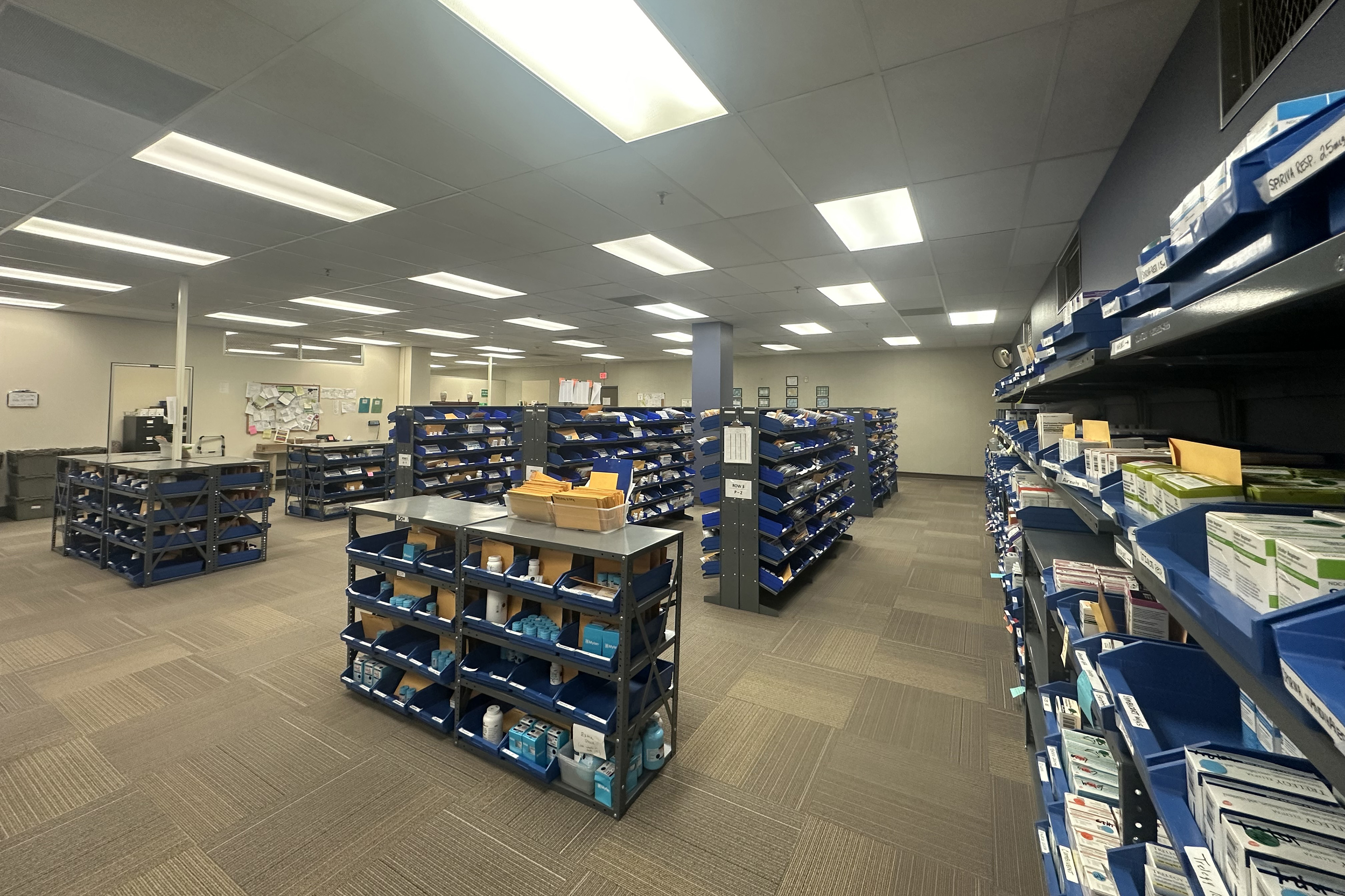 The Wyoming Medication Donation Program’s pharmacy is shown in this undated photo in Cheyenne, Wyoming. It is a large room containing rows of shelves that contain medication.