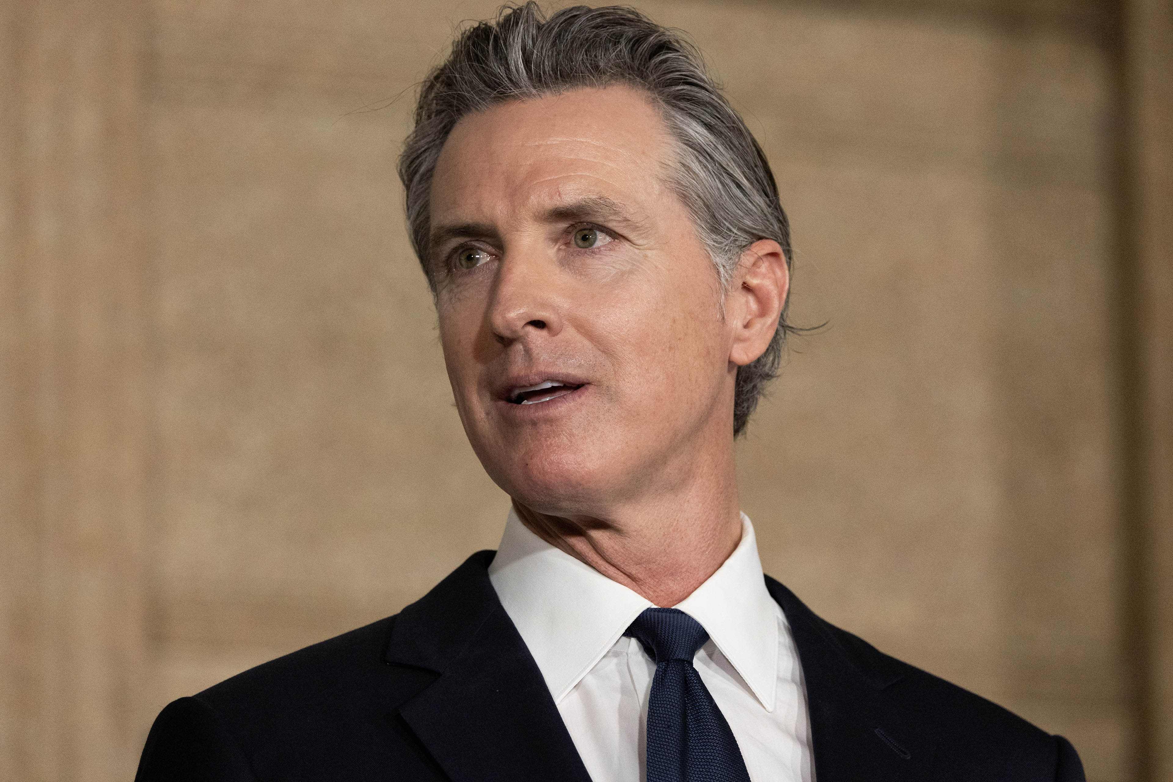 Delicate Labor-Industry Deal in Flux as Newsom Revisits  Minimum Health Wage
