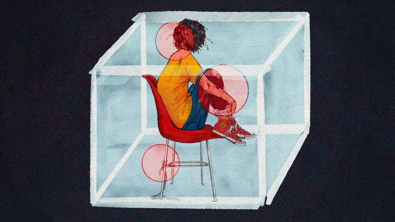 A digital illustration shows a child sitting in a chair inside a white-and-blue transparent box that resembles a small room. The child holds their knees to their chest and looks away from the viewer; their face is further concealed by their hair. Their right pant leg is ripped at the knee, and there are bruises on their arm. A rope is tied to the leg of the chair, but not to anything else. The background is a dark, textured void.