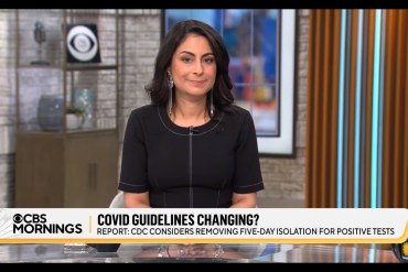 A screenshot from a video of Celine Gounder on CBS News. Text on the screen reads, "Covid guidelines changing? Report: CDC considers removing five-day isolation for positive tests."