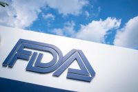 A photo of a sign with the FDA's logo is seen outside of its headquarters.