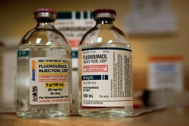 Two vials of Fluorouracil. The liquid inside the glass vials are clear.