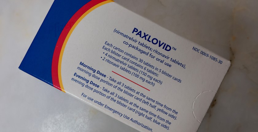 A box of Paxlovid is photographed from above.