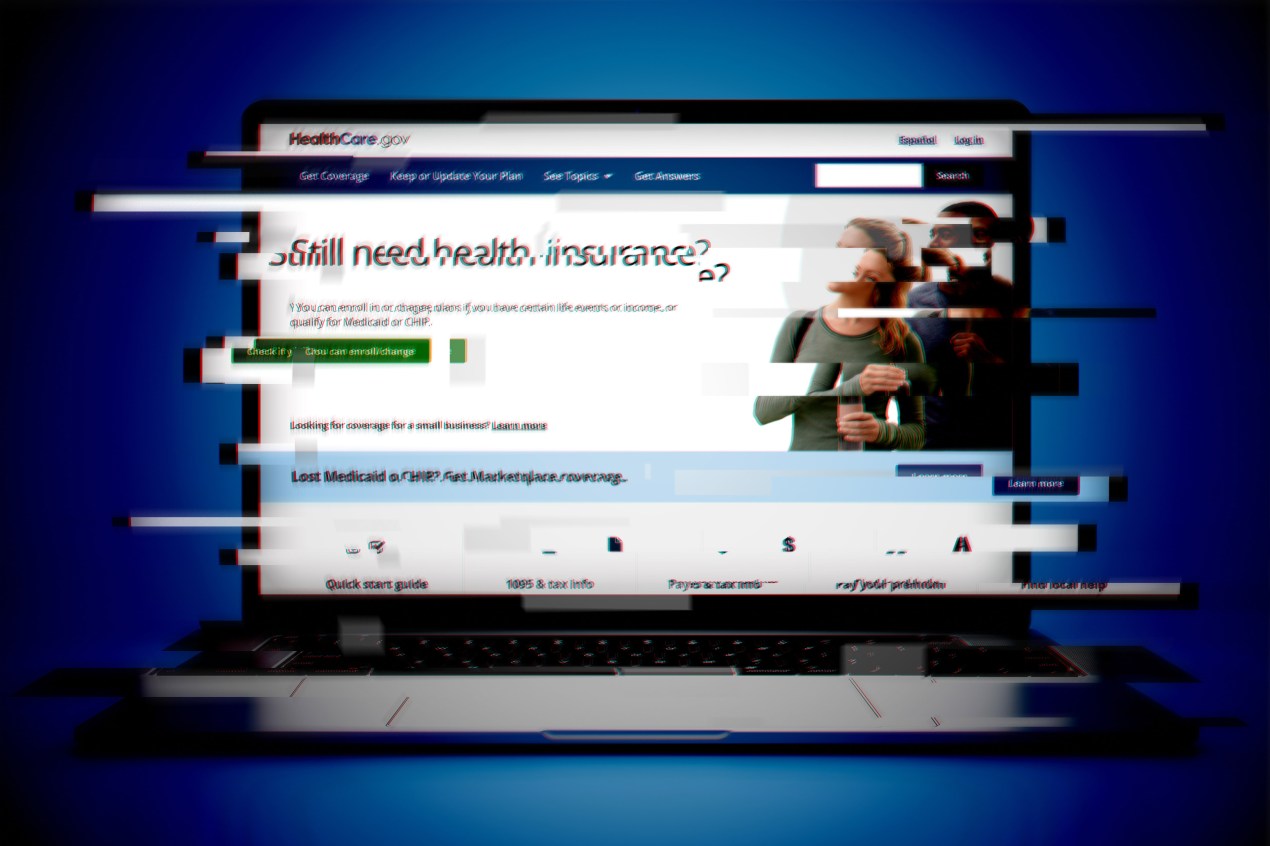A glitchy photo illustration of a laptop opened with the healthcare.gov website opened.